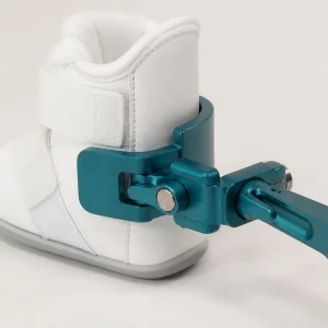 Quick connect bracket clamped onto a Ponseti boot